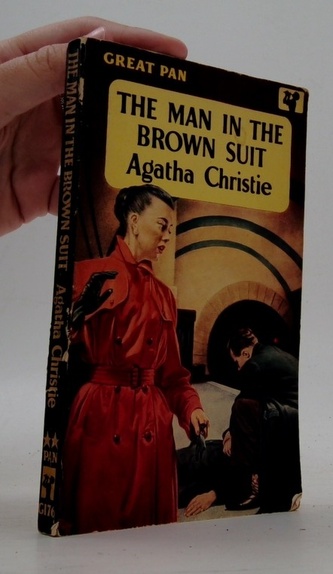 The man in the brown suit