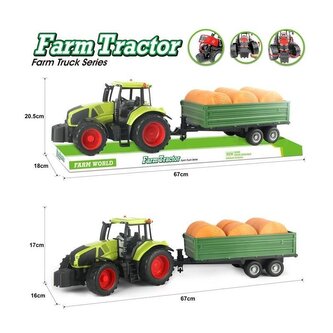 Traktor z belami słomy