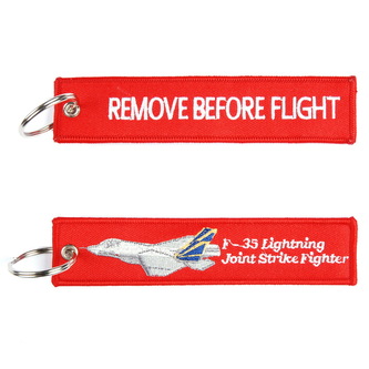 Přívěsek na klíče Fostex Remove before flight F-35 Lightning 1 - červený