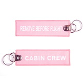 Přívěsek na klíče Fostex Remove before flight Cabin Crew - růžový