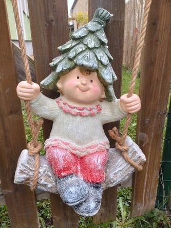 Kluk na houpačce MG  lístková čapka