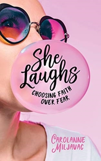 SHE LAUGHS