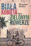 BIAŁA KOBIETA NA ZIELONYM ROWERZE