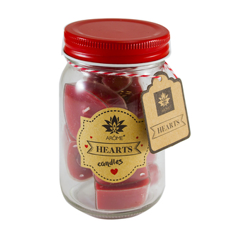 8 malých svíček ve tvaru srdce ve sklenici