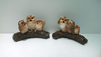 Soví rodinka na větvi